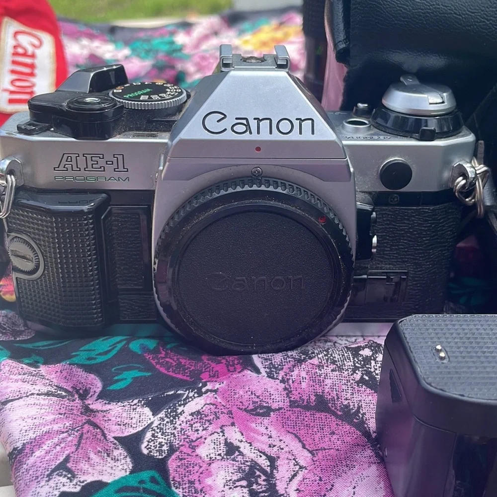 Canon ae 1 program camera with lenses and other accessories